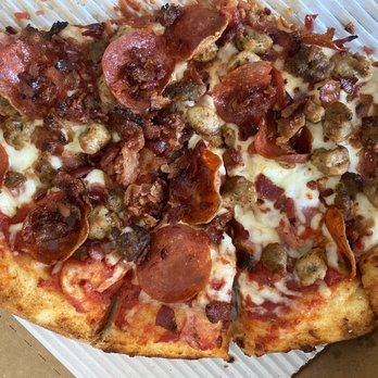 Greek's Pizzeria - What's left of the inside of the box - Gourmet Meat Pizza. Delicious! - Pizza Near Me - Carmel, Indiana Greek's Pizzeria - What's left of the inside of the box - Gourmet Meat Pizza. Delicious! - Pizza Near Me - Carmel, Indiana