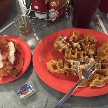Spoons Cafe - Pecan Waffles with honey almond butter and a side of egg and bacon - American Near Me - McKinney, Texas Spoons Cafe - Pecan Waffles with honey almond butter and a side of egg and bacon - American Near Me - McKinney, Texas