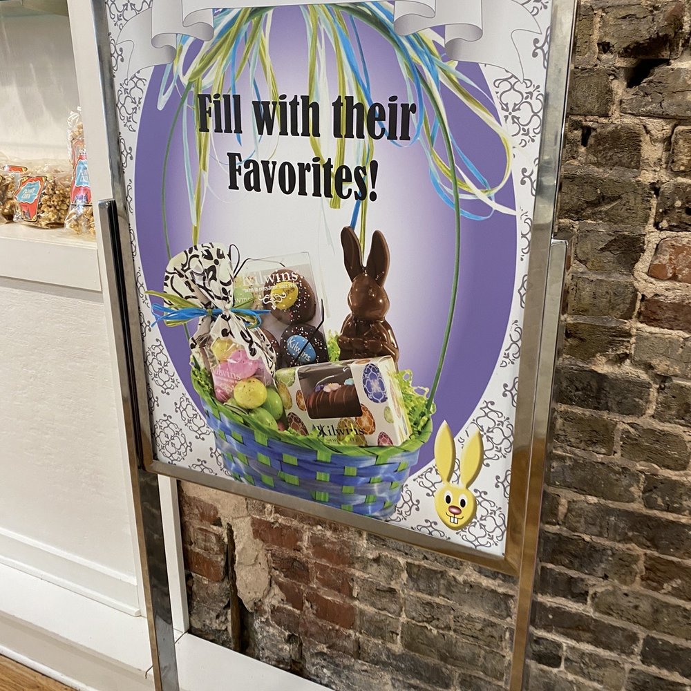 Kilwins Ice Cream - Chocolate - Fudge - a sign with a basket of chocolate eggs - Chocolatiers & Shops Near Me - Knoxville, Tennessee
