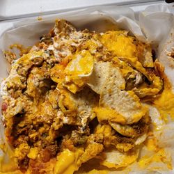 Strikes Bar & Grill - Soggy nachos! Probably 2 T. of meat
