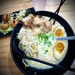 Hokkaido Ramen House - Garlic pork Ramen w/a side of deep fried sticky rice w/bean paste & finally chopped octopus. Appetizer sounds odd, taste delicious!