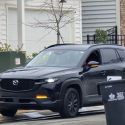 Cusick Company - Blocking the road to take pictures of trash bins that were dumped today.....and trash has been 2wks behind