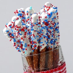 Sweet E's - Festive pretzel rods- dipped in your choice of chocolate and covered in sprinkles