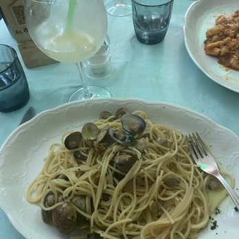 Al Grottino - Spaghetti with baby clams - Seafood Near Me - Capri, NA Al Grottino - Spaghetti with baby clams - Seafood Near Me - Capri, NA