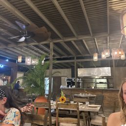 Table with kitchen in backround. Table with kitchen in backround.