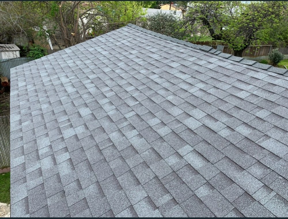 Slide of Trinity Roofing L & R Brothers