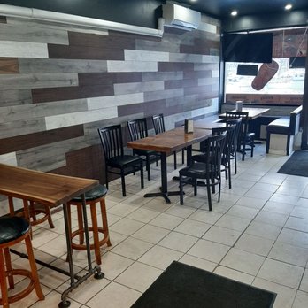 Al-Sherooq - tables and chairs in a restaurant - Middle Eastern Near Me - Toronto, Ontario Al-Sherooq - tables and chairs in a restaurant - Middle Eastern Near Me - Toronto, Ontario