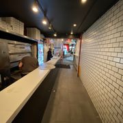 Photo of 2 Bros Pizza - New York, NY, United States. Interior