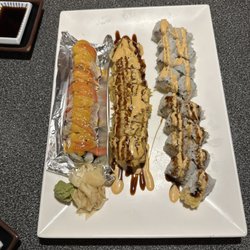 Fuji Sushi & Sake Bar - Tiger roll, Dynamite, scallop, fried Red Snapper rolls.