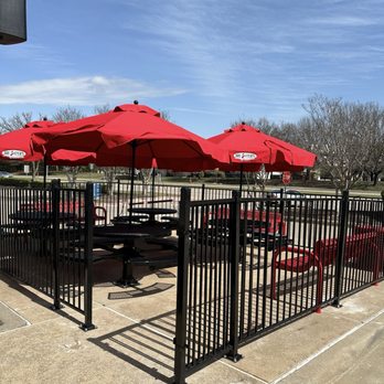 Bruster's Real Ice Cream - A cute patio area with tables and umbrellas to enjoy your treats! - Desserts Near Me - Richardson, Texas
