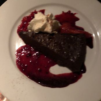 Roaring Fork - Chocolate cake with Berry sauce - American Near Me - Scottsdale, Arizona