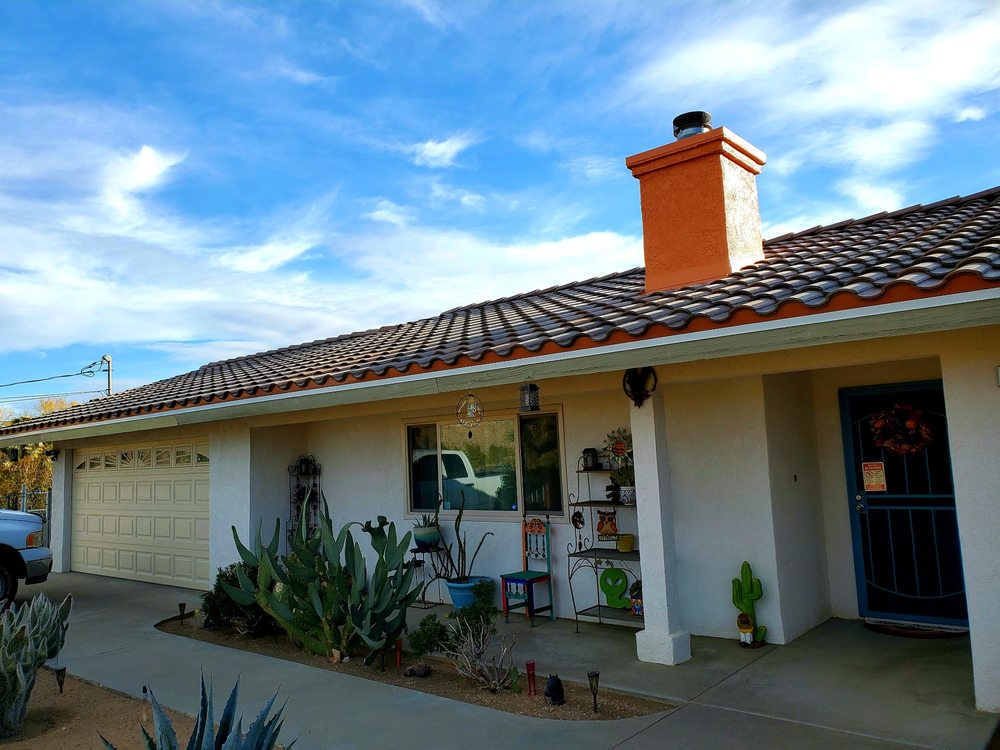 Slide of Dew Roofing