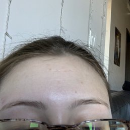 My uneven eyebrows. If you look at my nose bridge the one on the left has a chunk missing making it shorter.