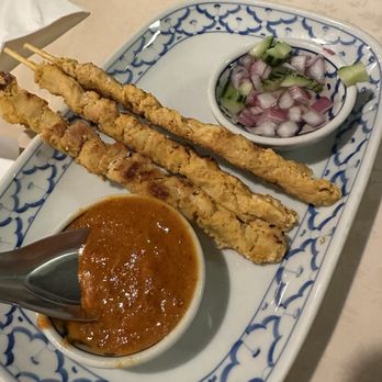 Attaros Thai - Chicken satay with peanut sauce and Thai cucumber salad. - Thai Near Me - Chandler, Arizona