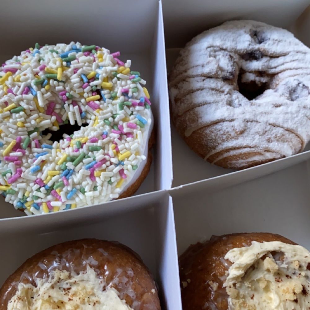 Beacon Doughnuts - Chocolate chip cookie dough, birthday cake, blueberry pancake (second right row, right hand side), carrot cake (bottom row) - Donuts Near Me - Chicago, Illinois Beacon Doughnuts - Chocolate chip cookie dough, birthday cake, blueberry pancake (second right row, right hand side), carrot cake (bottom row) - Donuts Near Me - Chicago, Illinois