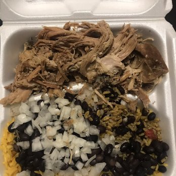 Pipo's Restaurant - Roast pork w/black beans, yellow rice, onion - Cuban Near Me - Tampa, Florida Pipo's Restaurant - Roast pork w/black beans, yellow rice, onion - Cuban Near Me - Tampa, Florida