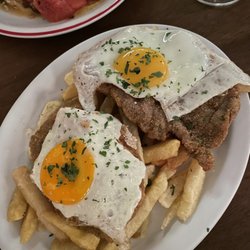Los Galgos - Milanesa of peceto with free range eggs and thrice cooked fried potatoes on top