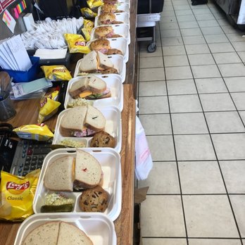 Stackerz Deli - a long table of sandwiches - Sandwiches Near Me - Southfield, Michigan Stackerz Deli - a long table of sandwiches - Sandwiches Near Me - Southfield, Michigan
