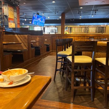 Outback Steakhouse - a plate of food on a table - Steakhouses Near Me - Salisbury, Maryland