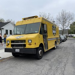 The Tasty Taxi - Truck outside of house