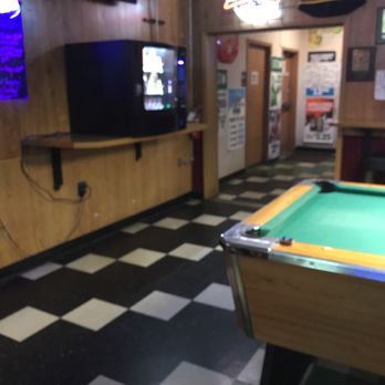 Alibi Tavern - a pool table and television - Pubs Near Me - Springfield, Oregon