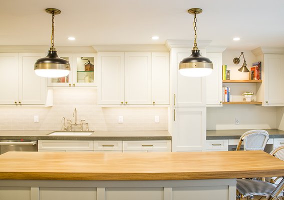 Farmhouse Inspired Kitchen - This entire kitchen is custom-made, starting from expanding the walls to creating custom kitchen cabinets. The island has a custom wood countertop and all the details throughout the kitchen are hand-made. All these elements come together to create a picturesque, modern yet traditional kitchen. Farmhouse Inspired Kitchen - This entire kitchen is custom-made, starting from expanding the walls to creating custom kitchen cabinets. The island has a custom wood countertop and all the details throughout the kitchen are hand-made. All these elements come together to create a picturesque, modern yet traditional kitchen.