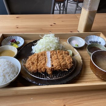 Katsu San - Tonkatsu meal - rice, cabbage salad, 2 salad dressings, 3 dips (salt + wasabi, pepper/sesame, katsu sauce), and hearty miso soup. - Japanese Near Me - Richmond, British Columbia Katsu San - Tonkatsu meal - rice, cabbage salad, 2 salad dressings, 3 dips (salt + wasabi, pepper/sesame, katsu sauce), and hearty miso soup. - Japanese Near Me - Richmond, British Columbia