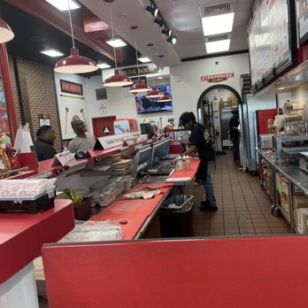 Firehouse Subs - The restaurant and employees and manager introducing a new customer to the store - Sandwiches Near Me - Los Angeles, California
