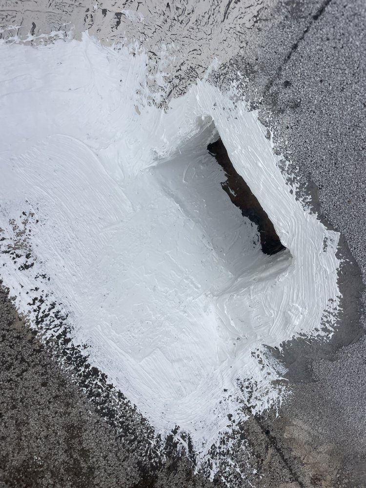 Slide of A Town Roofing