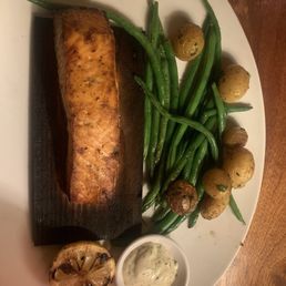 Cedar Plank-Roasted Salmon with potatoes and green beans. Cedar Plank-Roasted Salmon with potatoes and green beans.