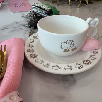 Hello Kitty Cafe - Adorable T cup with pink napkin and pink hello Kitty sugar cube - Themed Cafes Near Me - Santa Clara, California