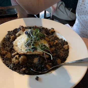 B Matthews Eatery - Curry lentils with cauliflower and a fried egg spicy - New American Near Me - Savannah, Georgia