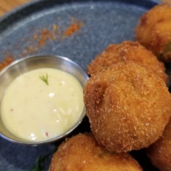 Yellowbelly - Deviled Crab Fritters, Passionfruit Mustard - New American Near Me - St. Louis, Missouri Yellowbelly - Deviled Crab Fritters, Passionfruit Mustard - New American Near Me - St. Louis, Missouri