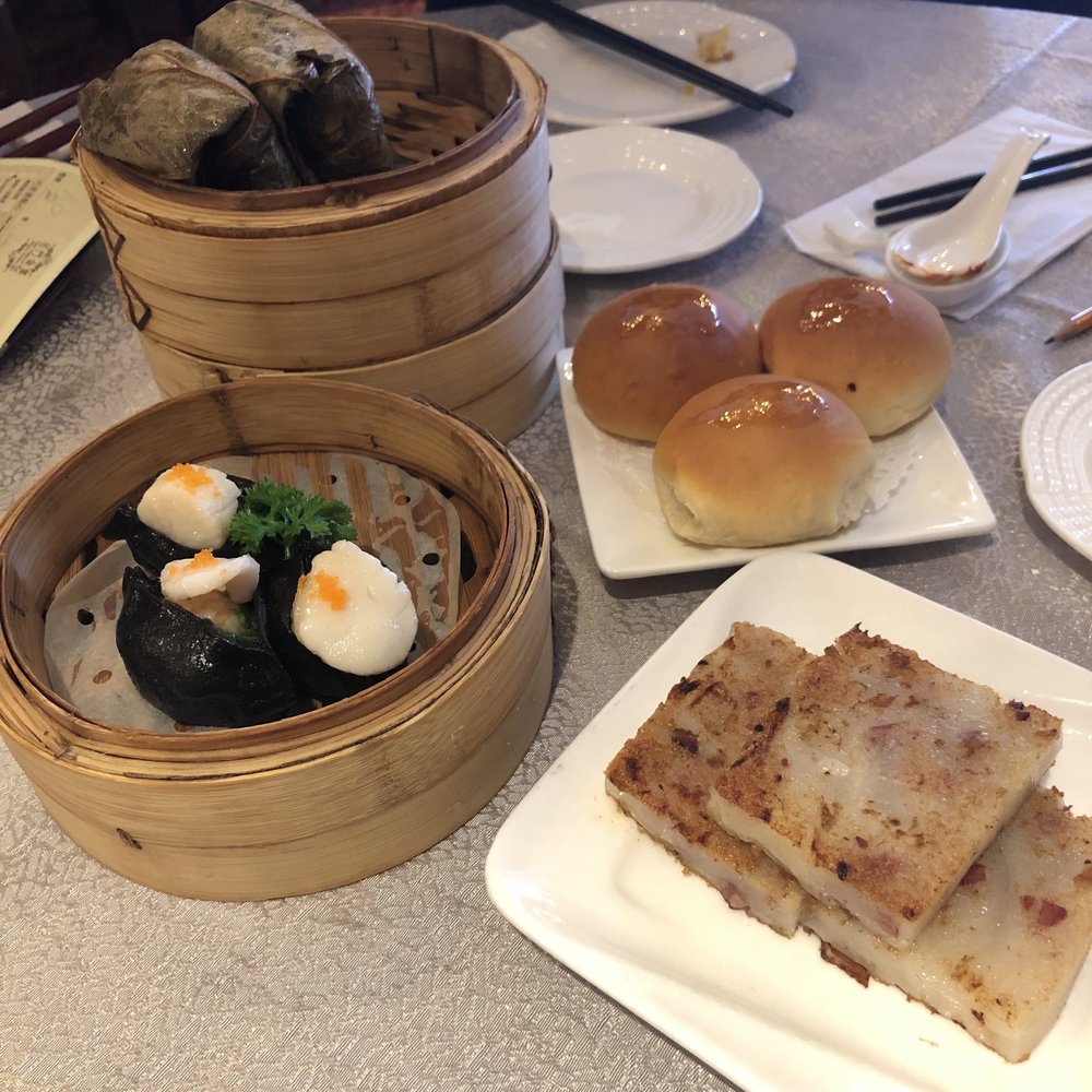 Casa-Imperial - Scallop & spinach dumplings with black skin (left), pork buns (top right), and turnip cakes (bottom right) - Dim Sum Near Me - Scarborough, Ontario Casa-Imperial - Scallop & spinach dumplings with black skin (left), pork buns (top right), and turnip cakes (bottom right) - Dim Sum Near Me - Scarborough, Ontario