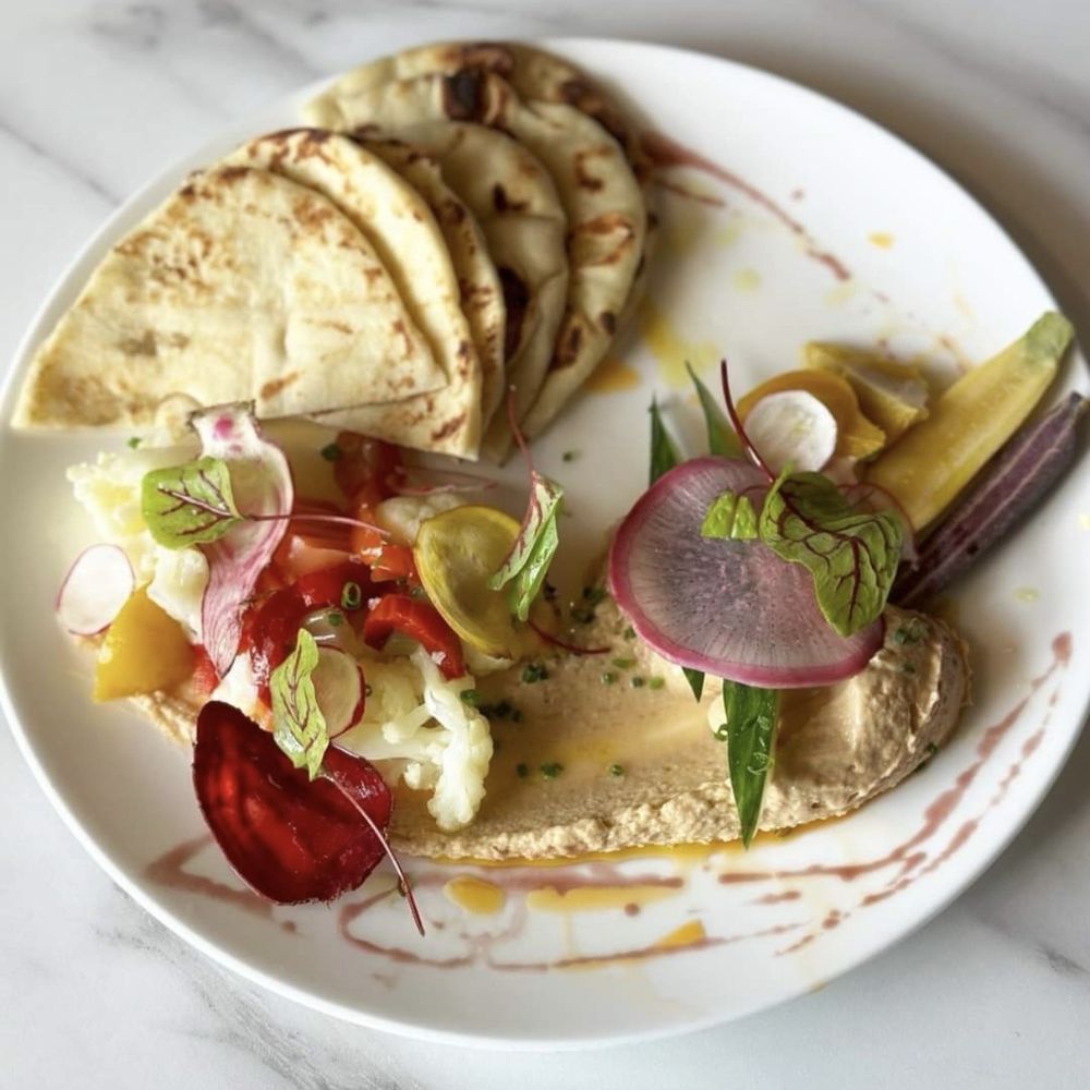Hummus with pita and pickled veggies makes Hummus with pita and pickled veggies makes