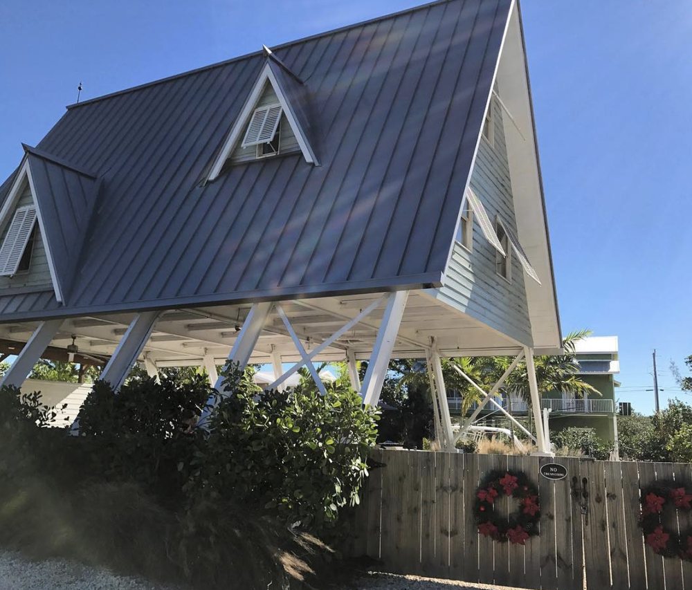 Slide of Isaacs Roofing