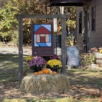 Serenberry Vineyards - a hay bale with pumpkins and flowers - Wineries Near Me - Morganton, Georgia Serenberry Vineyards - a hay bale with pumpkins and flowers - Wineries Near Me - Morganton, Georgia