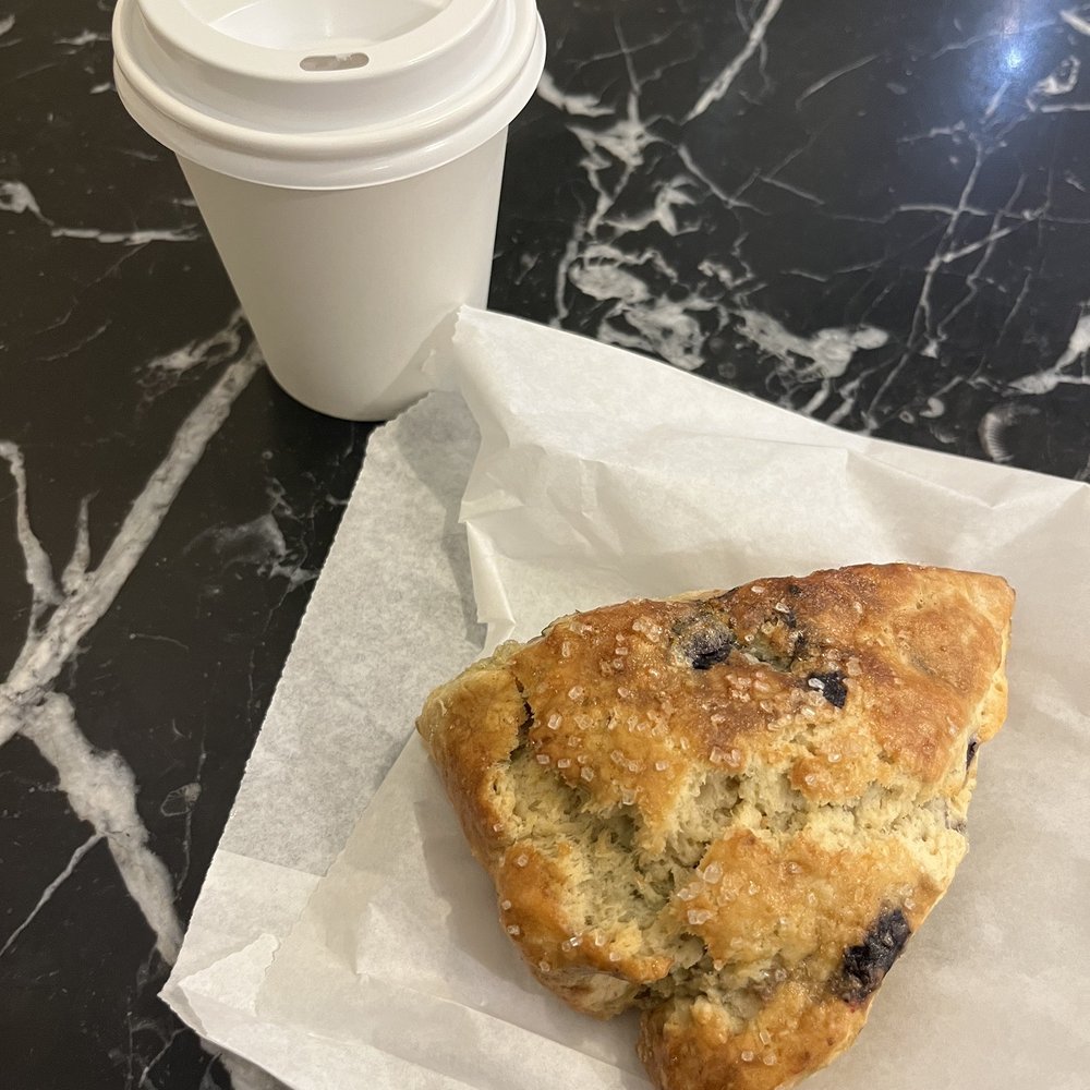 Blueberry scone, black coffee Blueberry scone, black coffee