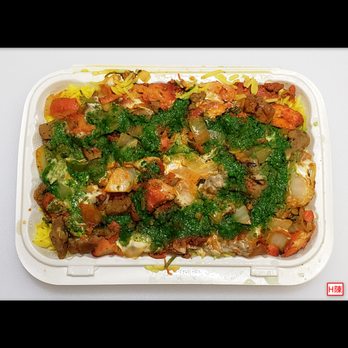 Halal Cart - Combo (lamb & chicken) over rice with white/hot/green sauces weighing 1.75lbs for $6 all-in.... - Food Trucks Near Me - Queens, New York