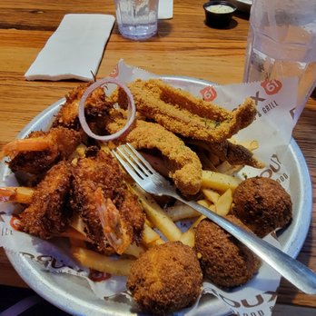 Roux 61 Seafood & Grill - Combination catfish and coconut shrimp dinner with fries and hush puppies - Seafood Near Me - Natchez, Mississippi