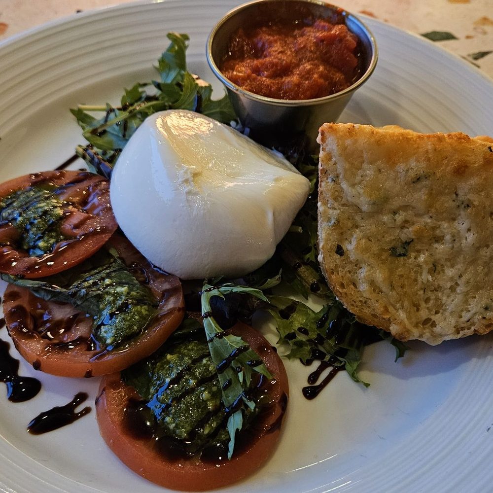 Georgie's Beachside Grill - Burrata appetizer served with hot marinara sauce and garlic bread - a masterpiece! - American Near Me - Newport, Oregon Georgie's Beachside Grill - Burrata appetizer served with hot marinara sauce and garlic bread - a masterpiece! - American Near Me - Newport, Oregon