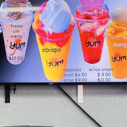 Raspados Solaris - Menu board says  small raspado $6.50 and $8.50 with ice cream
