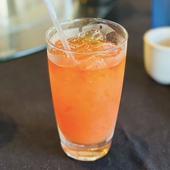 Real Wok - a glass of orange juice with a straw - Dim Sum Near Me - Lake Worth, Florida Real Wok - a glass of orange juice with a straw - Dim Sum Near Me - Lake Worth, Florida