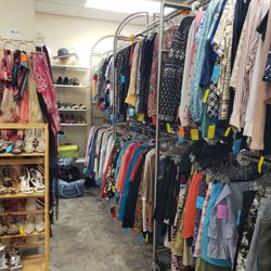 New Life Thrift Shop - More shoes and women's clothing