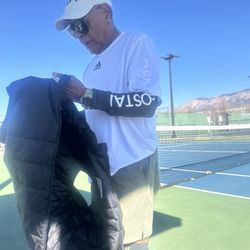 North Domingo Baca Park - Gil closes his tennis gear after a long Friday set against his nemesis .