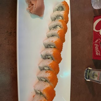 Rock & Roll Sushi - a roll of sushi on a white plate - Sushi Bars Near Me - Hidalgo, Texas