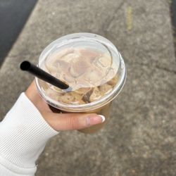 The Surfing Bean Coffee Company - "Customer favorite" - an iced oat milk latte with brown sugar and cinnamon