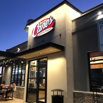 Raising Cane's Chicken Fingers - the outside of a restaurant - Chicken Shop Near Me - Glendale, Arizona Raising Cane's Chicken Fingers - the outside of a restaurant - Chicken Shop Near Me - Glendale, Arizona