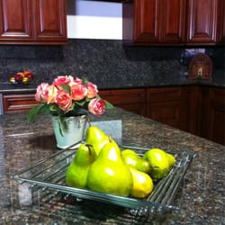 Houma Kitchen & Bath - Merlot cabinet& tan brown