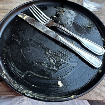 Delicioso Bistro - Practically licked it clean. The sauce, the poached egg and ham were all perfect - Diners Near Me - Modesto, California